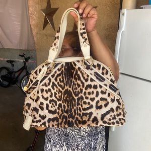 Hardly ever used, animal print, larger sized shoulder bag.